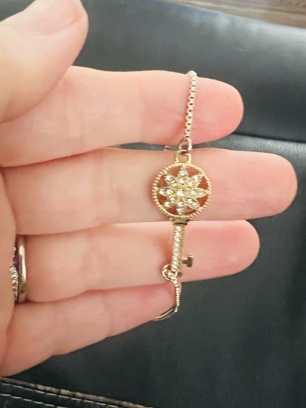 Gold Key Pendant Bracelet with Sparkling Crystal Flower